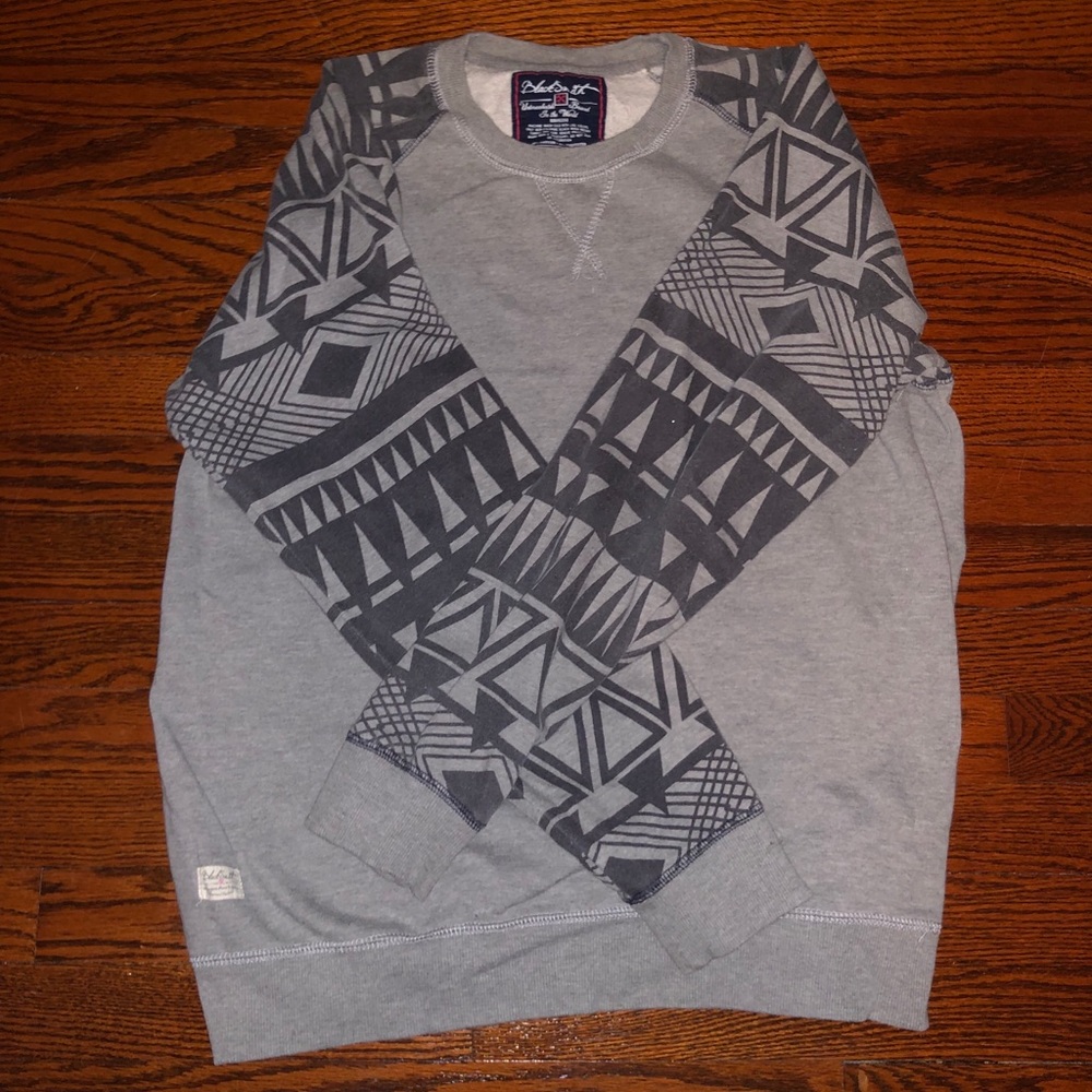Grey and black patterned sweater